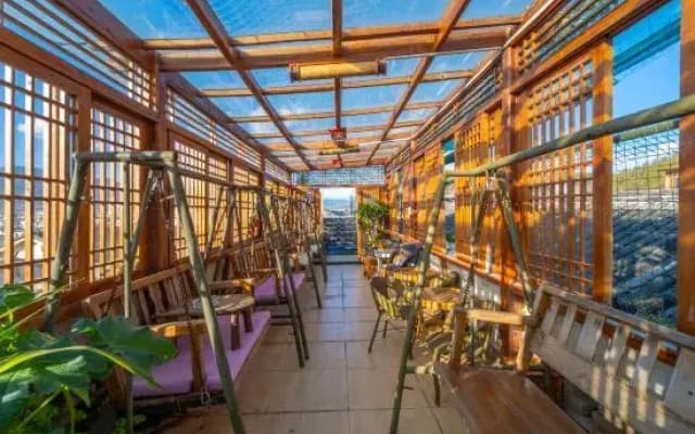 Yuxue Qingcheng Snowview Boutique Inn(御雪晴城·Starrysky日照金山观景美宿（丽江古城大水车店）)