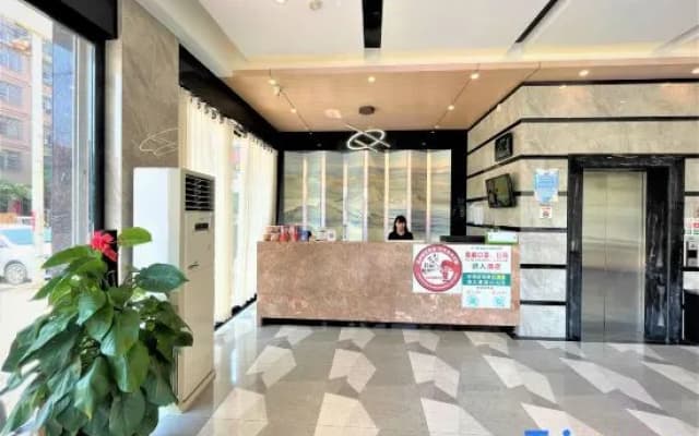 Xingang Boutique Apartment Hotel (Yulin Chinese Medicine Port Branch)
