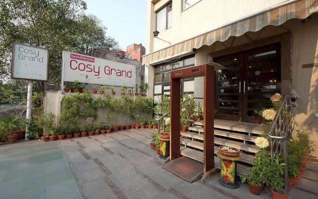 Cosy Grand @Chanakyapuri by The Cosy Hotels.