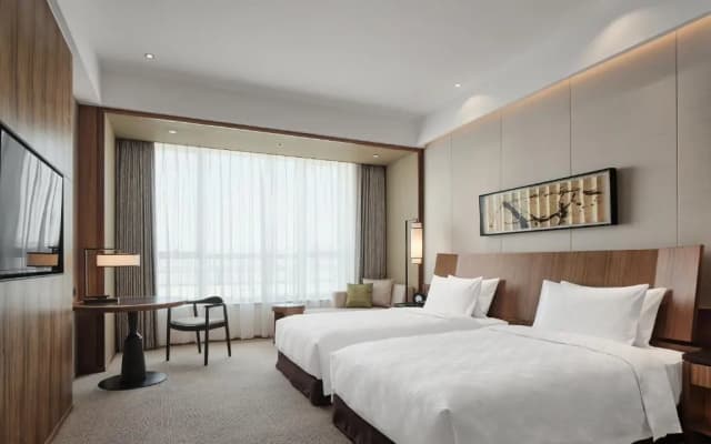 HUALUXE Ningbo Harbor City by IHG