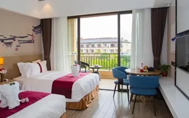 Jinshi Business Hotel (Wanning Shimei Bay Wangfujing duty-free port store)