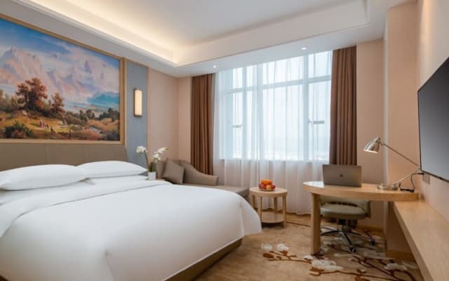 Vienna Hotel (Qujing High Speed Railway Station Wuguanyi Center)