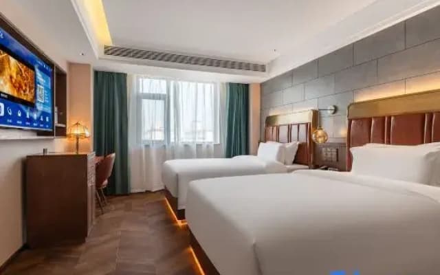 James Joyce Coffetel Hotel (Tianshui South Railway Station Shengda Plaza)