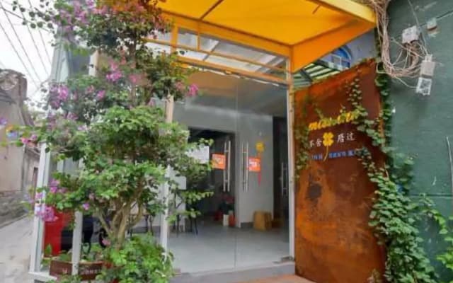 Bushe Cuoguo Inn