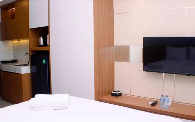 Comfortable Design Studio Room At Vasanta Innopark Apartment