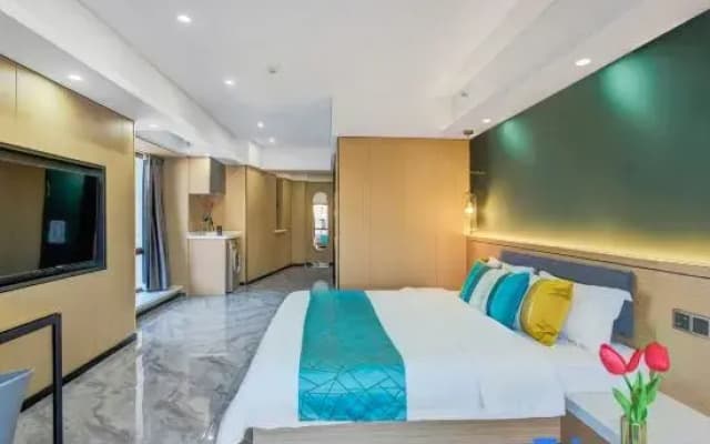Huizhi Zhenxing Hotel Apartment (Harbin Hasi Station Branch)