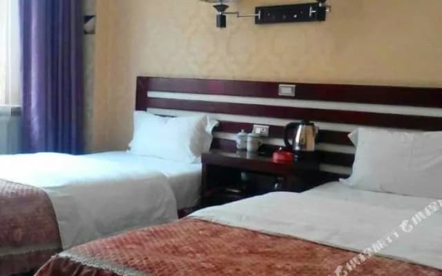 Linjiang Guanglong Business Hotel