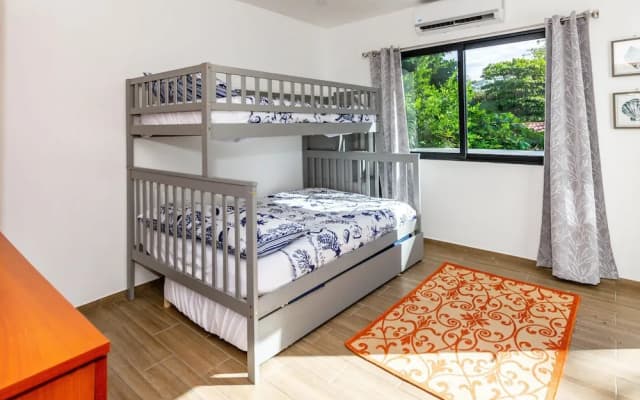 Ultramodern Townhome with an Inviting Coastal Design and Lush Outdoor Oasis with a Private Pool