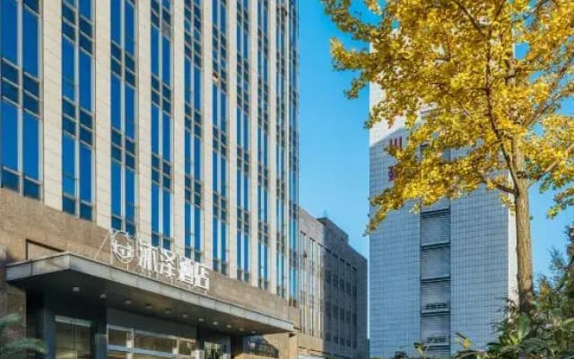 Muze Cinema hotel (Zhuji Baolong square high speed railway station store)
