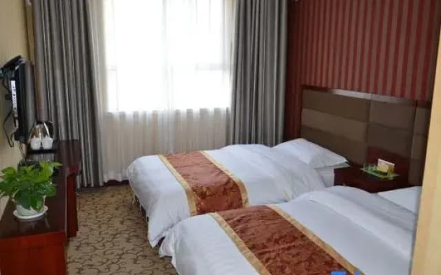 Korla Jiujia Home Business Hotel