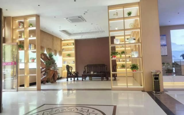 Wanjia Business Hotel (Zaozhuang Maoyuan)