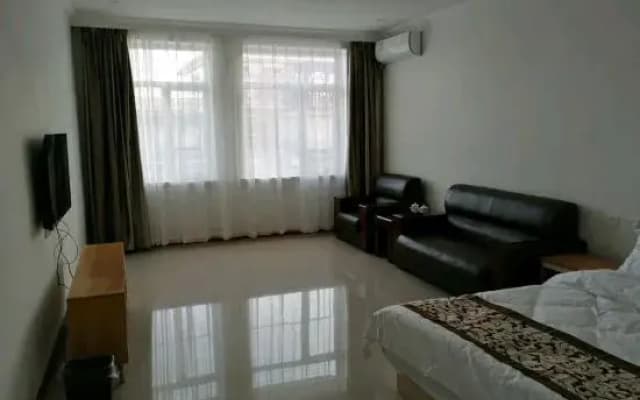 Kangping Hexing Hostel