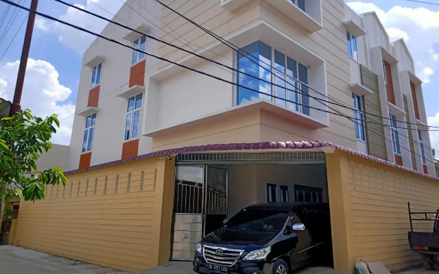 Hotel O Adam Malik Guesthouse Near Stasiun Medan
