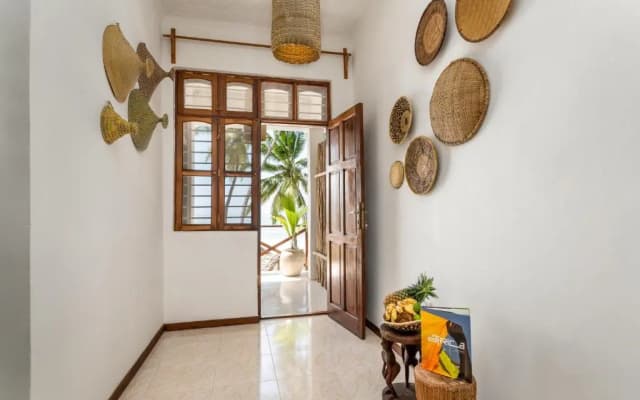 Kima Serviced Beach House & Suites