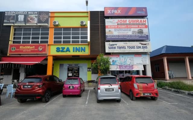 OYO 89436 SZA Inn
