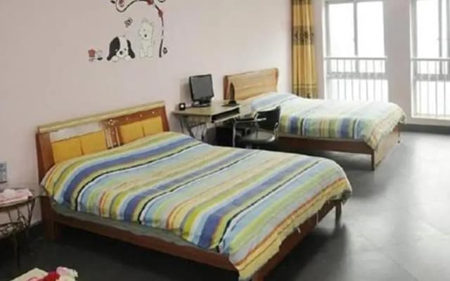 Huaxin Apartment Hotel