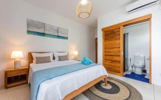 West Wood Holiday Apartment, C6 - Flic en Flac with pool at a quiet location, beautifully decorated and close to the beach