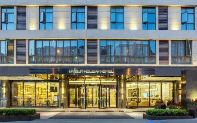 Shiyan Meisheng Holiday Hotel (Shanghai Road University Town)