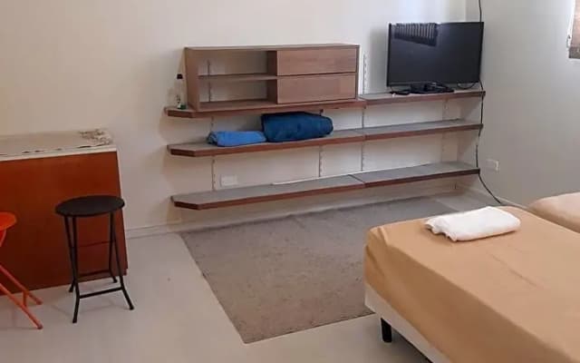 4 suites privativas