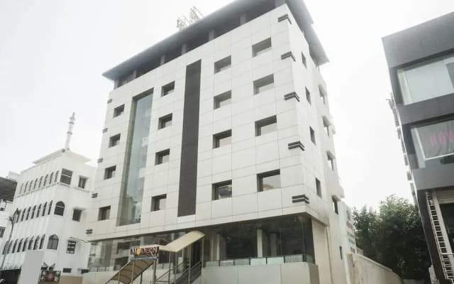 Super Townhouse OAK Regal Inn Near Sant Tukaram Nagar Metro Station