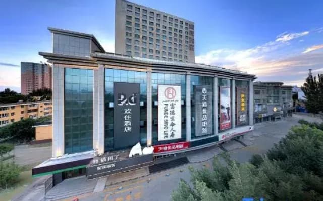 Yining Huan Zhu hotel.