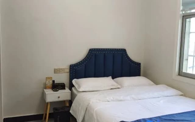 Neixiang Wangjia Business Express Hotel
