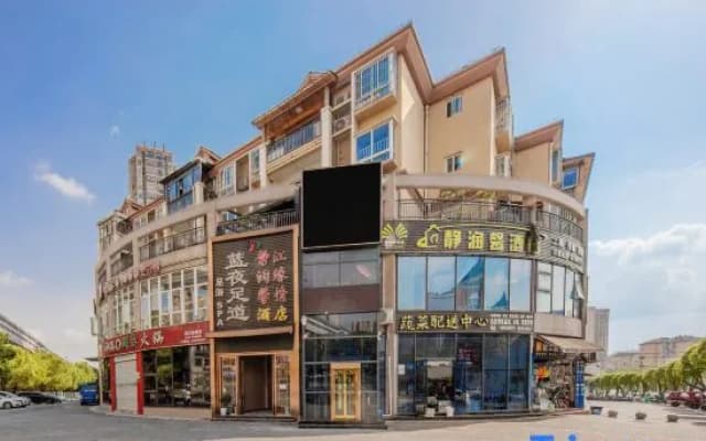 Chongqing Jingrunxin Business Hotel (Shengquansi Subway Station Wanda Plaza)