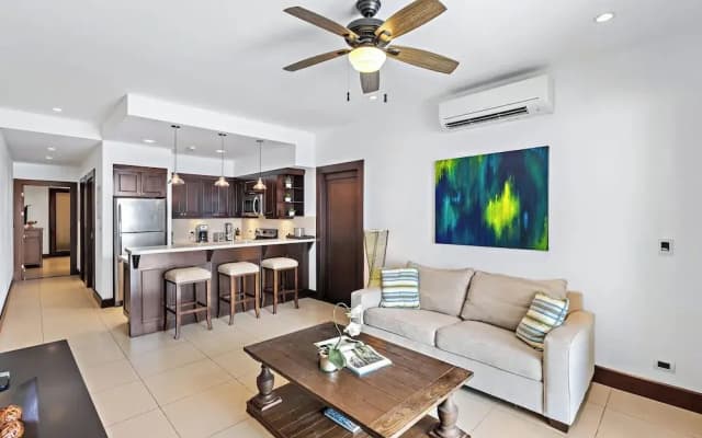 Luxury Condo with Panoramic Ocean Views, Sparkling Infinity Pool, and Modern Open-Concept Design