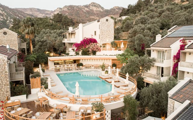 Отель Pilos Suites