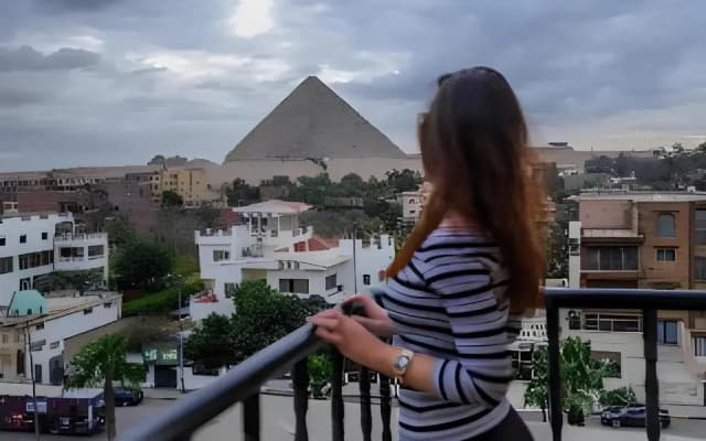 Отель Aura Inn Tiba Pyramids