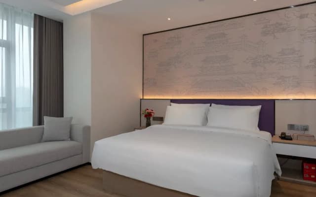 Maison New Century Hotel