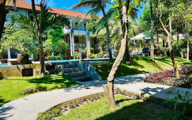 Отель Melasti Kuta Beach Hotel and Spa